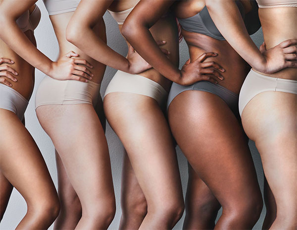 Photo of women's torso and legs.