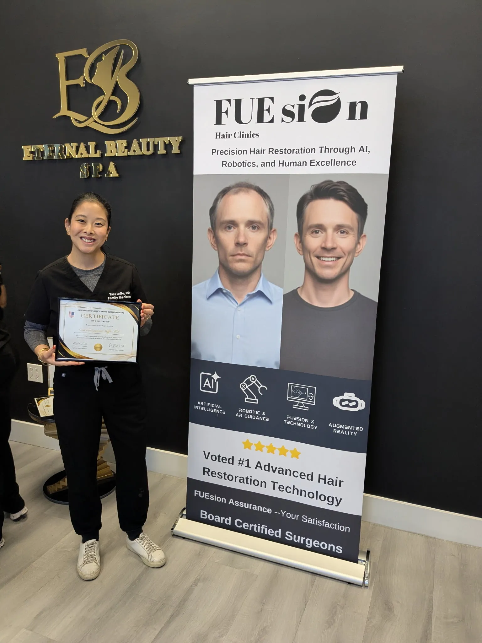 Tara looking cute standing next to FUE is On signage